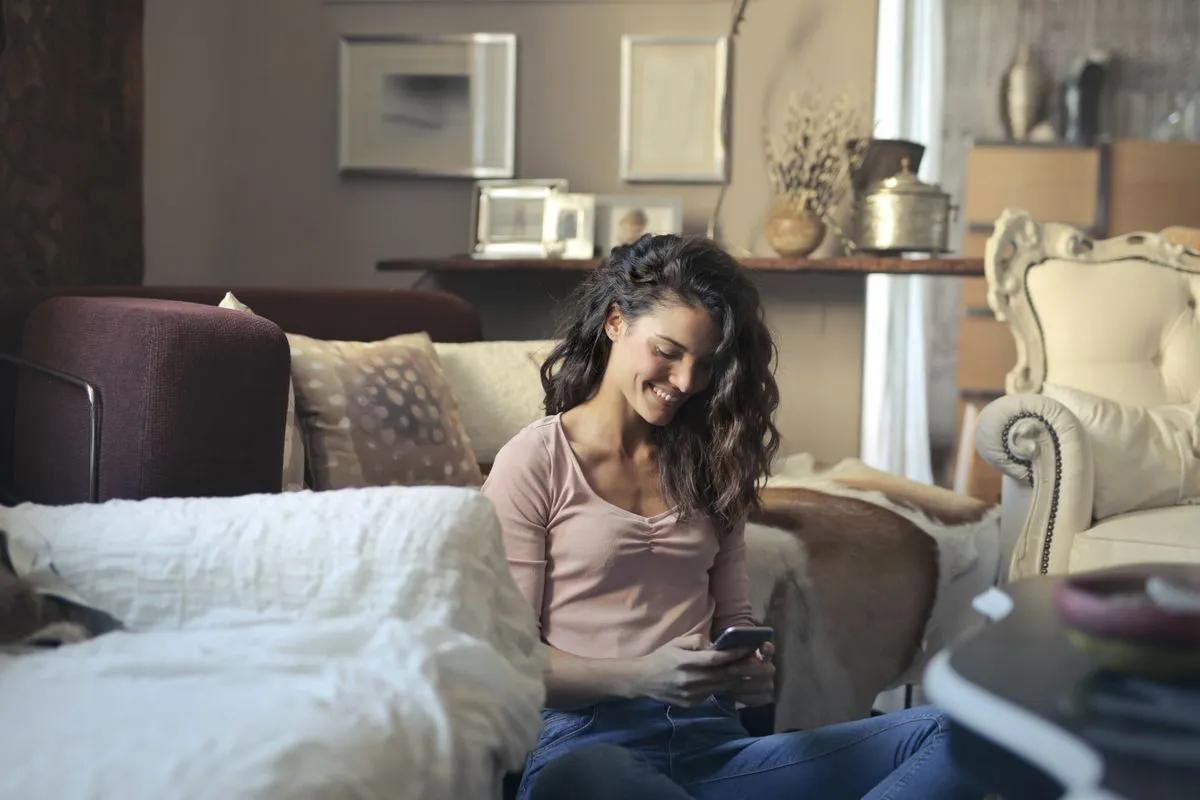 Vancouver resident applying for a small loan on her phone