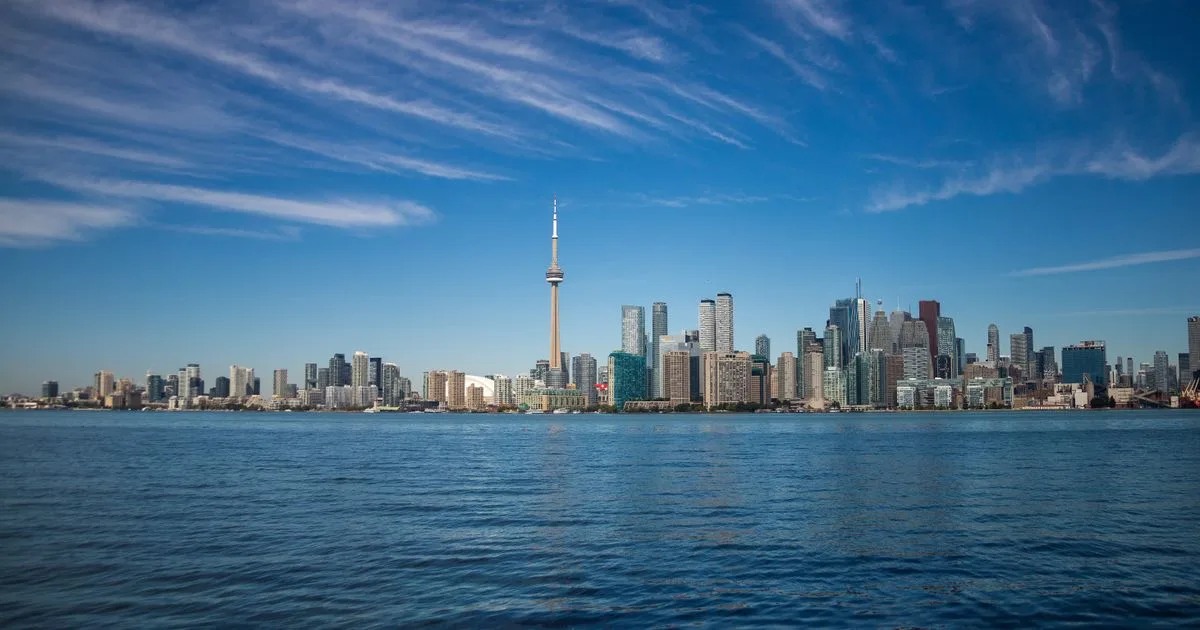 Small loans Toronto - CN Tower skyline over Lake Ontario